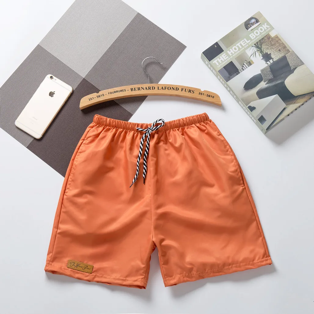 Men Casual Mid Waist Drawstring Solid Color Patch Shorts