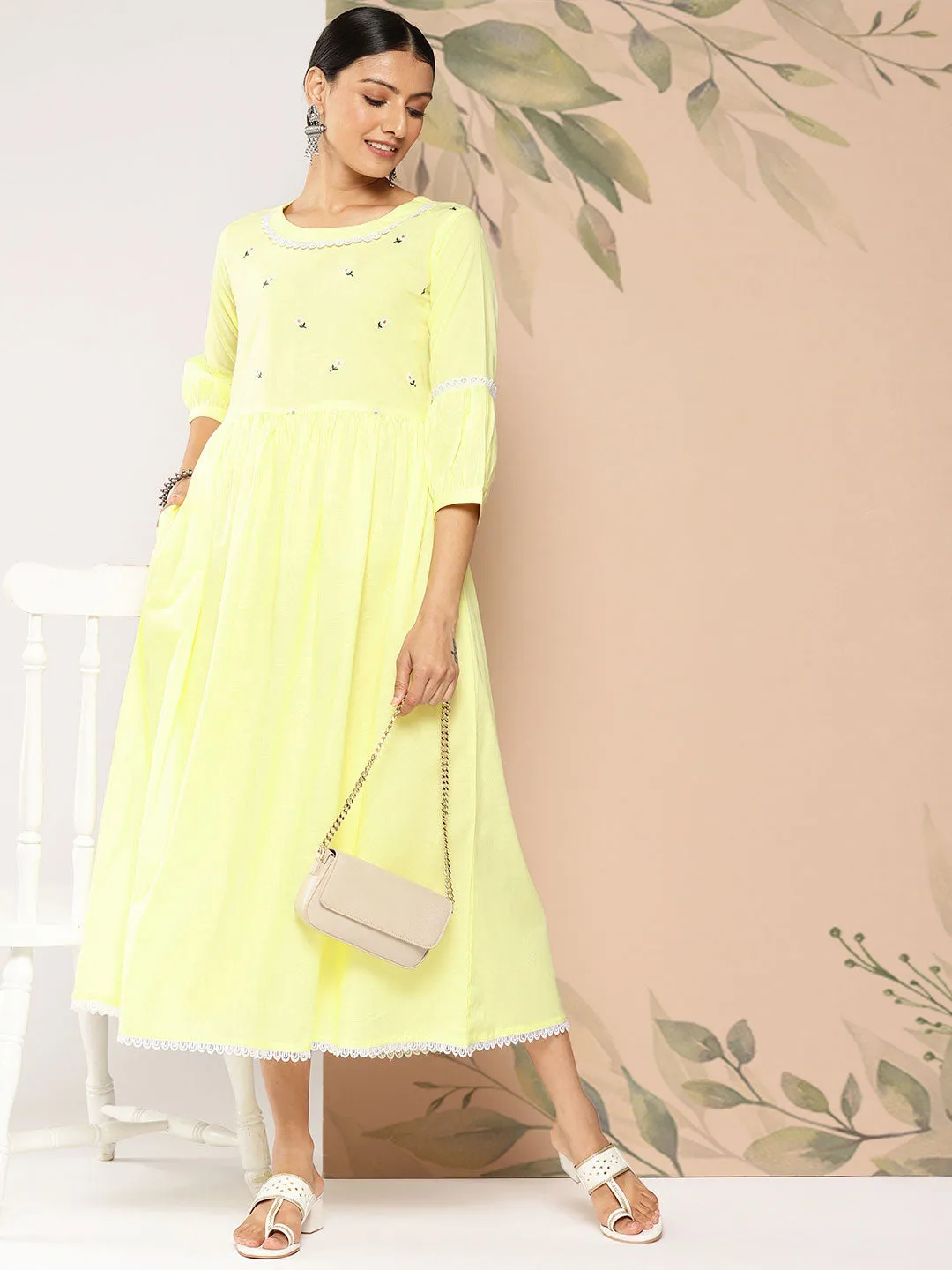 Women Yellow Embroidered Flared Dress With Three Quarter Sleeves